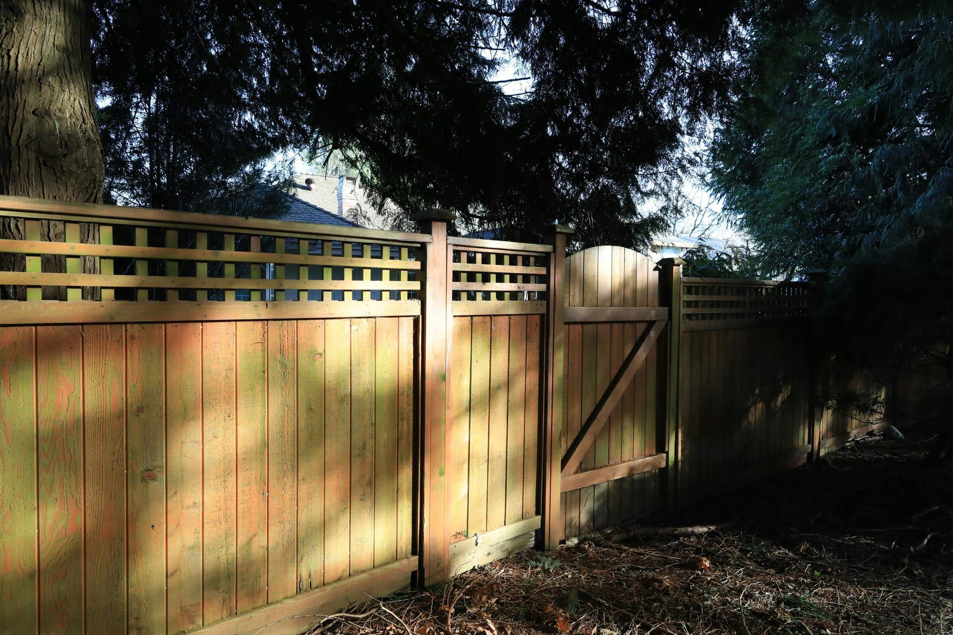 A code-compliant pool barrier fence and gate