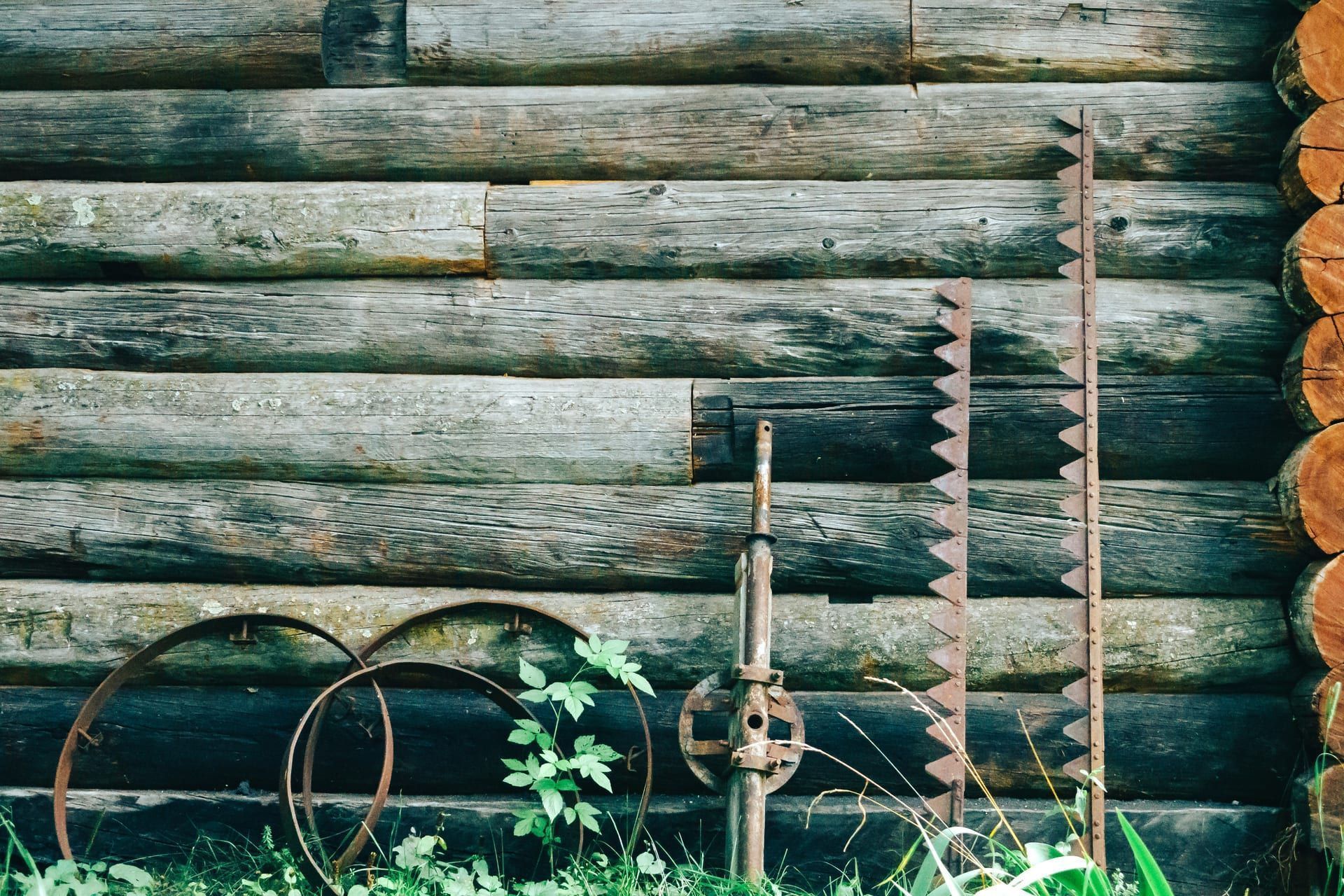 Digging fence post holes along a marked line