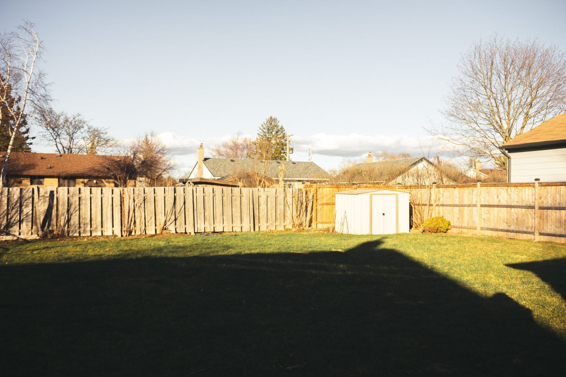 Property survey stakes marking a fence line